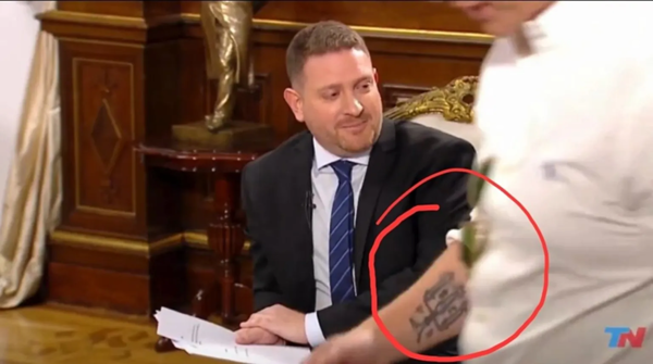 Controversial Tattoo of Milei's Advisor Sparks Debate