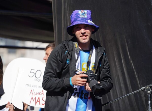 Photographer injured by gendarmes joins march for coup anniversary